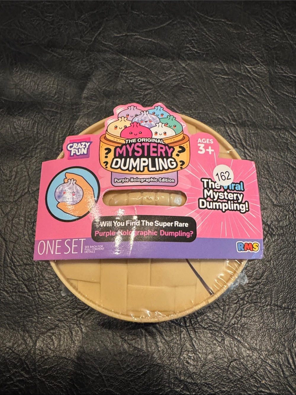 The Original Mystery Dumpling Purple Holographic Edition - Pink & Tan Packaging